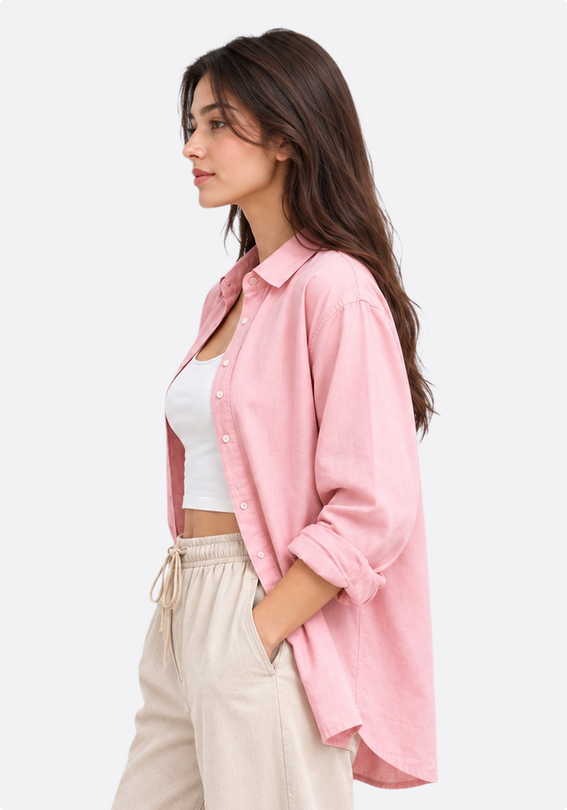 Women's blush pink oversized linen shirt – front view on model